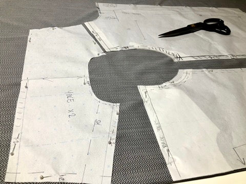 Laying and cutting fabric