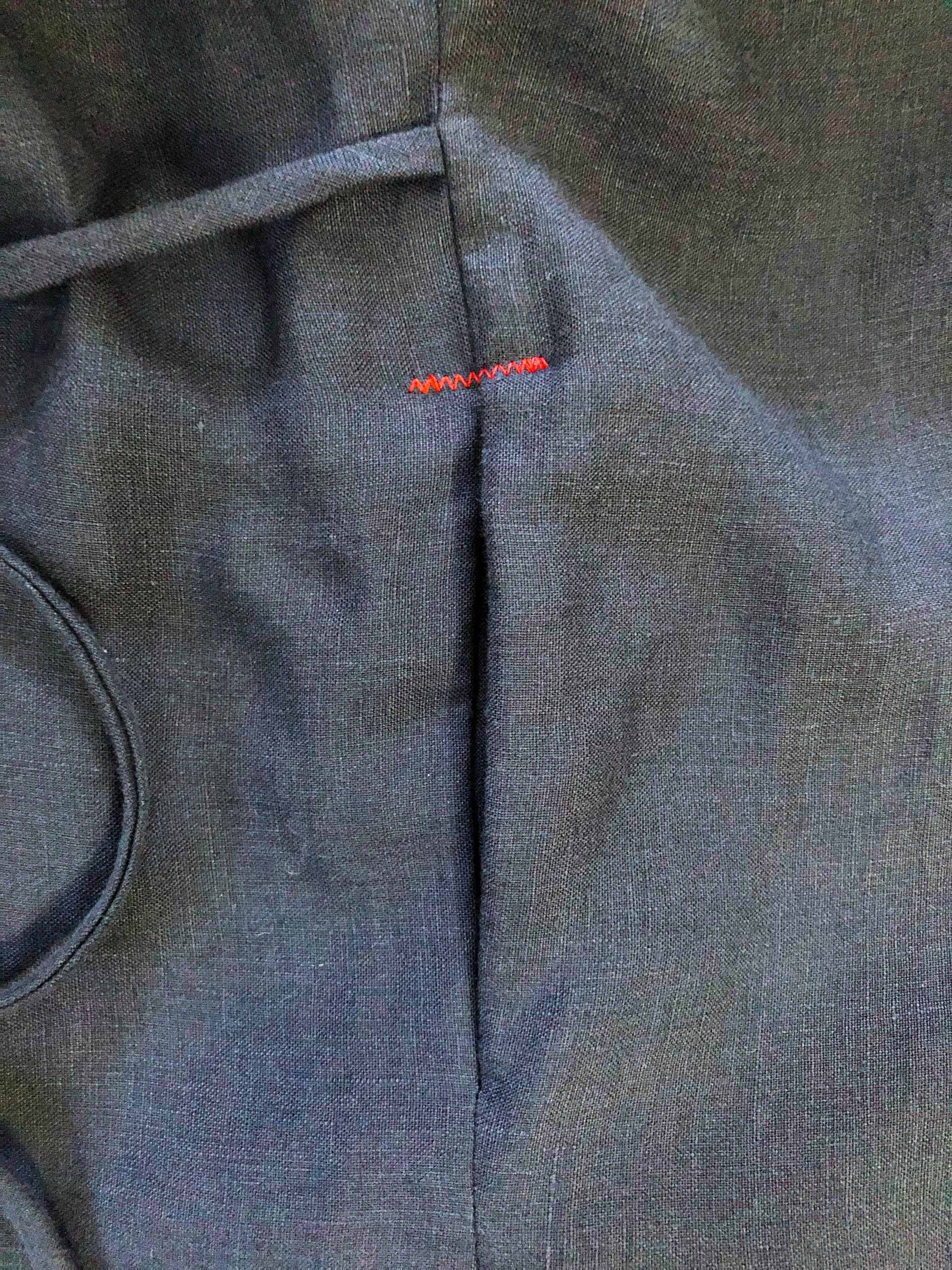 detail of debray dress side seam, pocket and tie